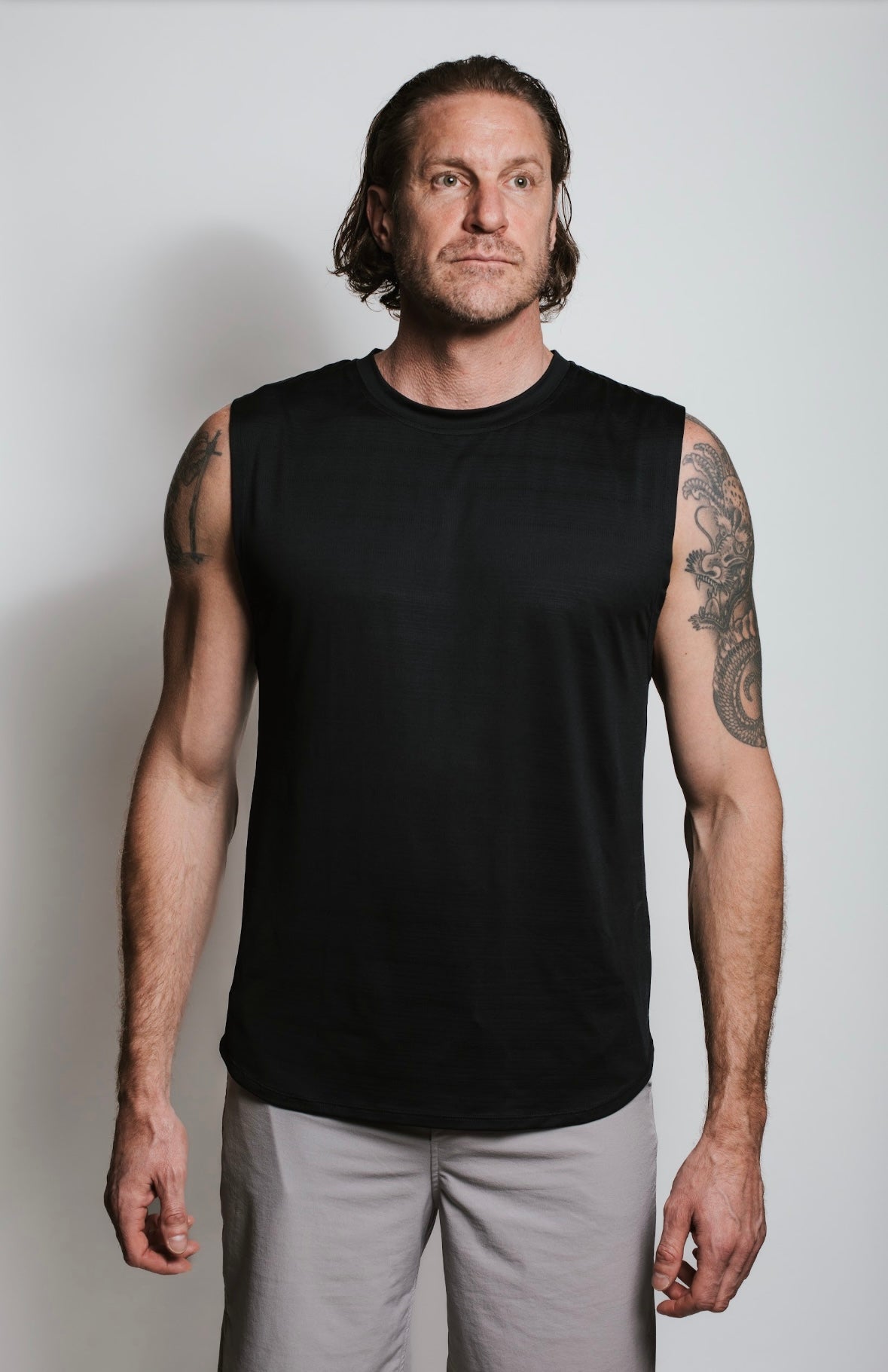 Tall men's lightweight performance tank in black – sweat-wicking and breathable